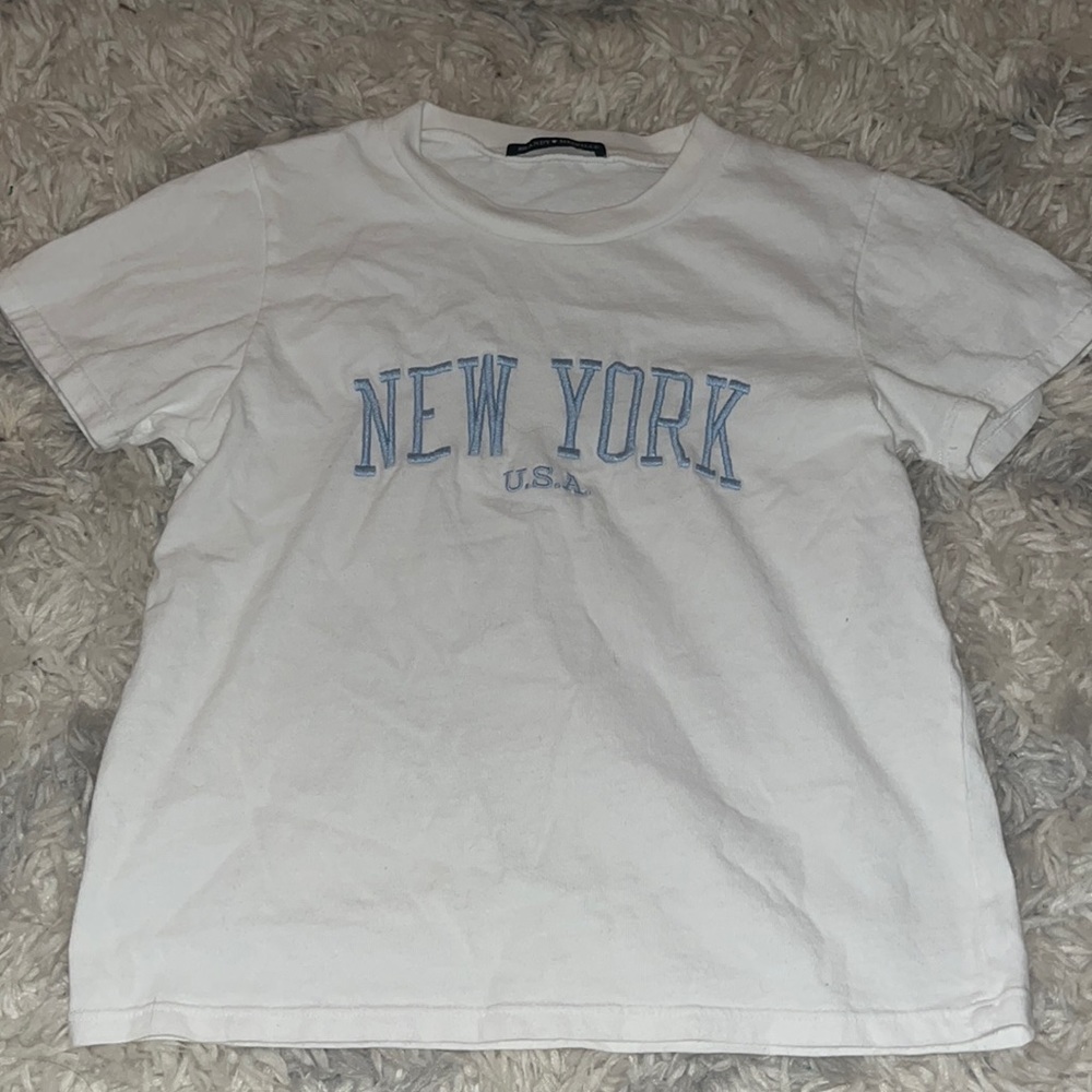 New York brandy melville tee that is sold at pacsun